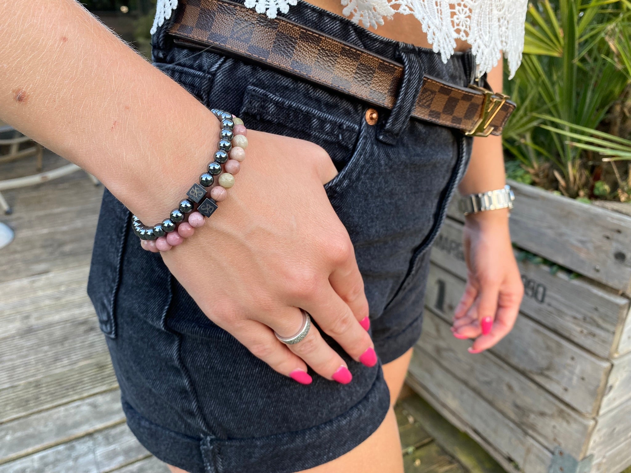 Hematite and rose quartz bracelets on the wrist, Christmas gift for her