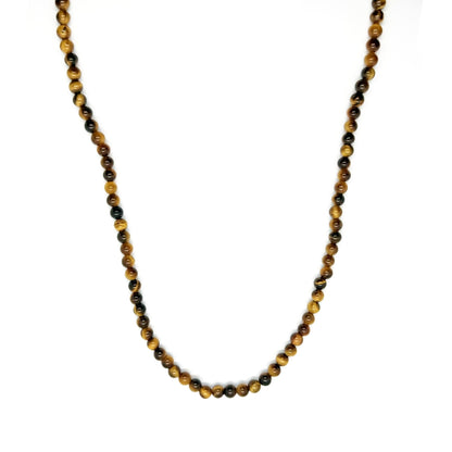 Introductie van Stoney Bracelets' Golden Gaze Necklace (6mm), een prachtig stuk gemaakt met ronde kralen in bruine en beige tinten. Deze elegante ketting wordt benadrukt door Gold Tiger Eye stenen tegen een effen witte achtergrond voor een tijdloze look.