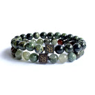 Een paar Serpent Set (8mm) armbanden met groene en zwarte jade natuursteenkralen van Stoney Bracelets.